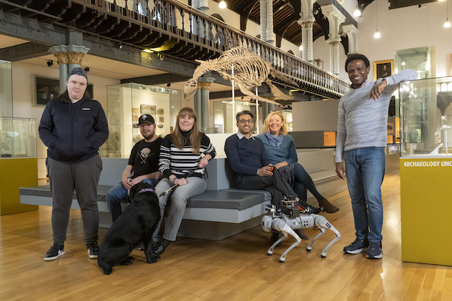 l-r) Georgea Strachan, Kyle Somerville and Laura Cluxton and her dog Sadie, all from the Forth Valley Sensory Centre, Dr Wasim Ahmad of the University of Glasgow’s James Watt School of Engineering, Jacquie Winning MBE of the Forth Valley Sensory Centre and Dr Olaoluwa Popoola of the of the University of Glasgow’s James Watt School of Engineering. 